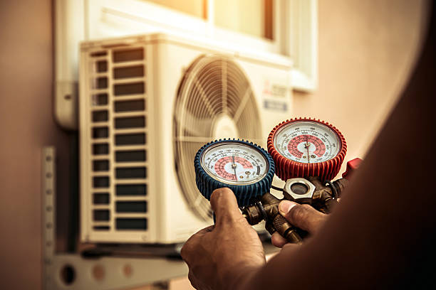 Professional Hvac technician working in Calverton, NY
